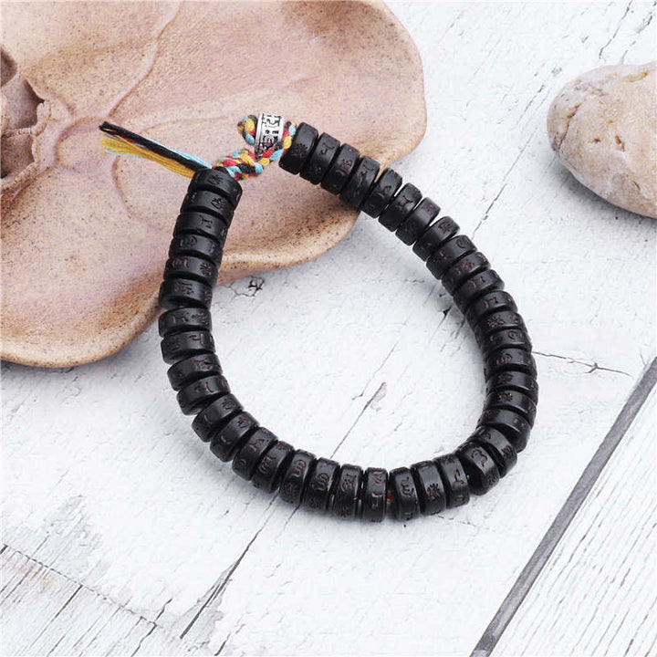 Buddha Stonesチベットココナッツシェルビーズ 彫刻入りオーム・マニ・パドメ・フムマントラ 幸福ブレスレット