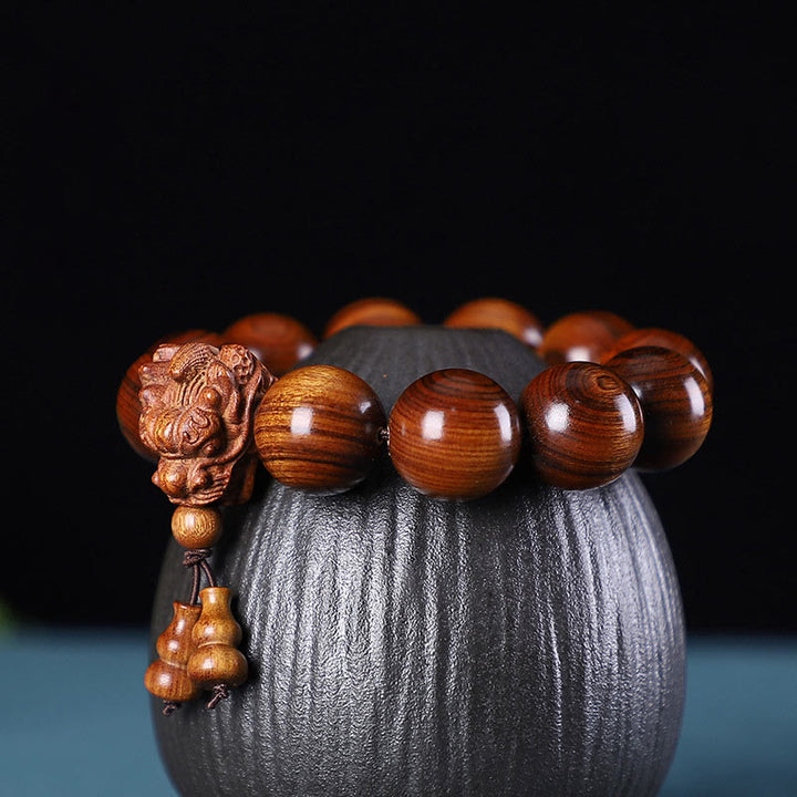 Buddha Stones、ローズウッド、グリーンサンダルウッド、小葉紫檀、龍彫刻の守護ブレスレット