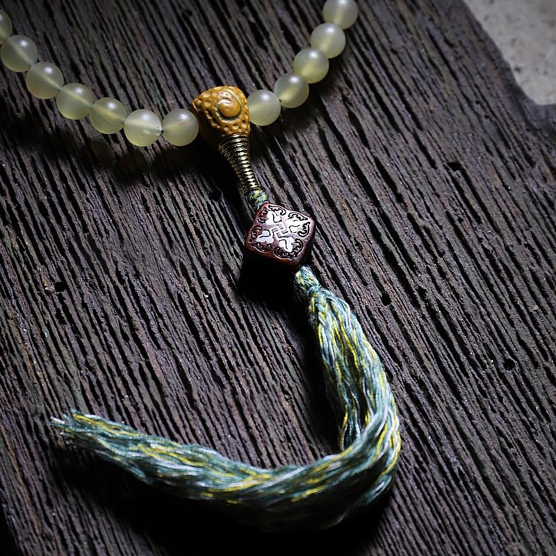 Buddha Stones108 個入りMalaビーズ チベット産 羊角琥珀 幸運のブレスレット