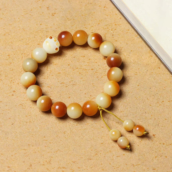 Buddha Stones天然菩提樹の実 愛らしい足爪 平和 知恵 ブレスレット