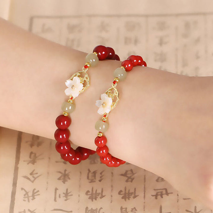 Buddha Stones天然辰砂翡翠ビーズ入りシャコガイ石花の祝福ブレスレット