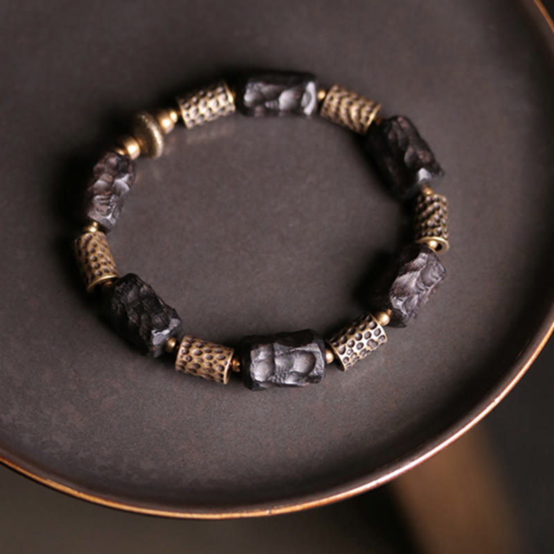 Buddha Stonesチベット黒檀 銅 穏やかで平和なブレスレット