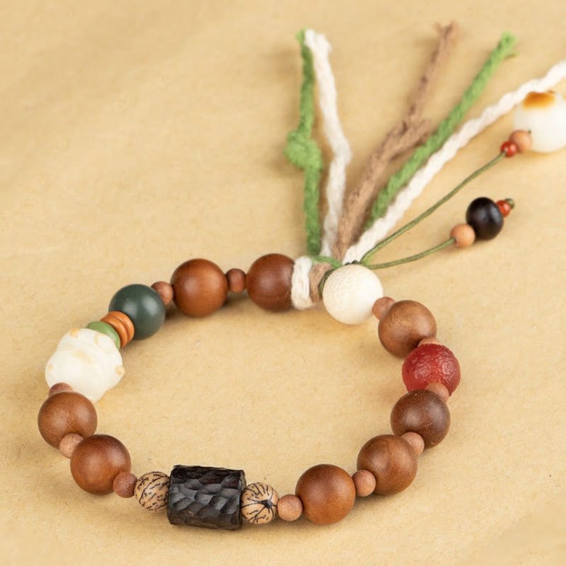 Buddha Stones雷撃 木製 菩提樹 猫の足爪 縁起物 守護 タッセルブレスレット - image 7