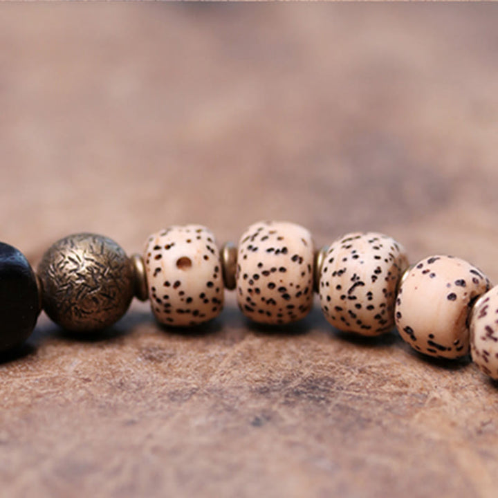 Buddha Stonesチベット菩提樹 黒曜石 黒檀 木 銅 平和ブレスレット
