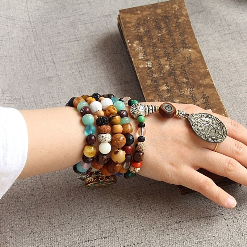 チベットのBuddha Stones108個のMala、九宮八卦菩提樹の実、ヤクの骨の金剛杵、調和のブレスレット