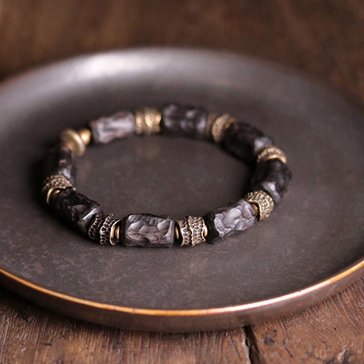 Buddha Stonesチベット黒檀 銅 穏やかで平和なブレスレット