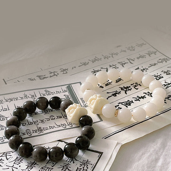 Buddha Stones銀の輝き 黒曜石 菩提樹の種 象牙 フルーツ ダンシングライオン 守護ブレスレット