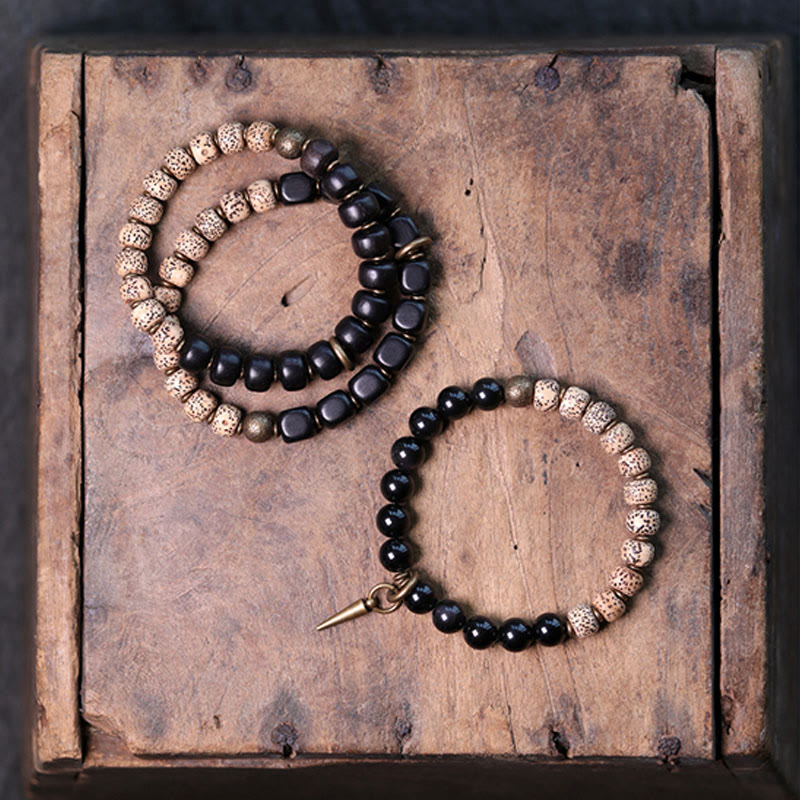 Buddha Stonesチベット菩提樹 黒曜石 黒檀 木 銅 平和ブレスレット