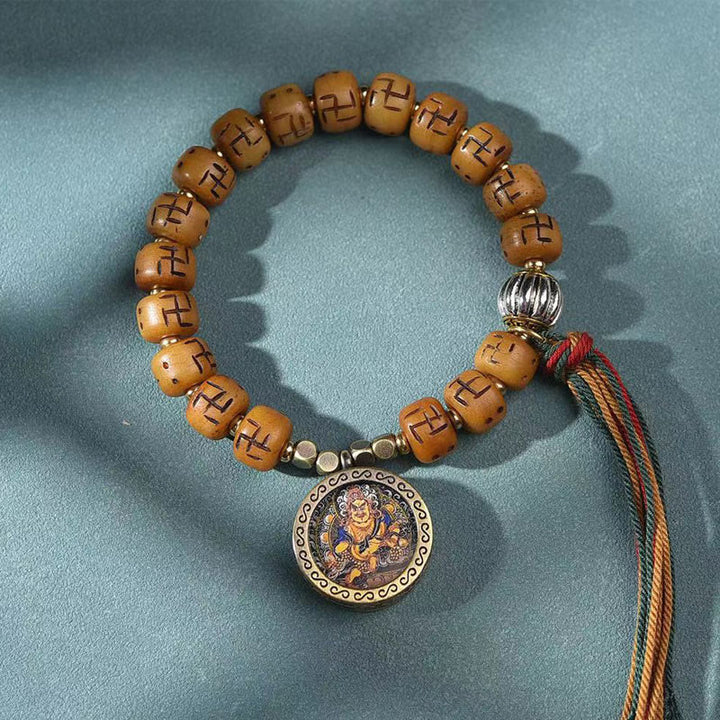 Buddha Stones天然チベットラクダ骨卍 Dzi ビーズ Shankha 仏陀チャーム Kirtimukha 幸運保護タッセルブレスレット