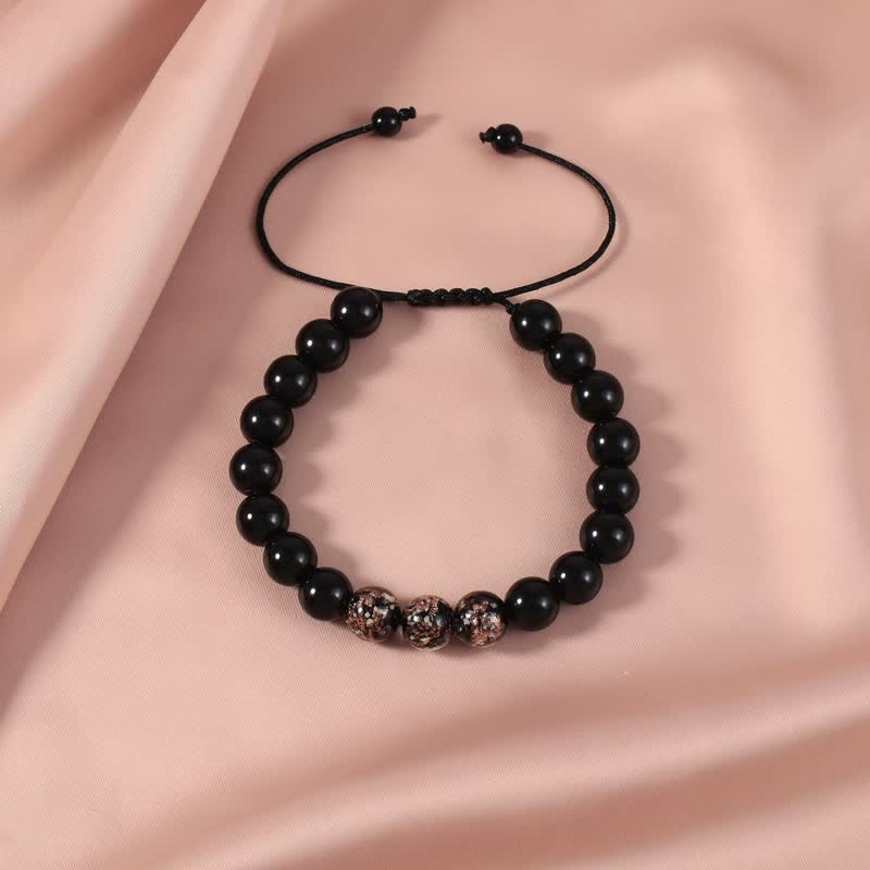 Buddha Stonesブラックオブシディアン 光るグロウストーン 強さのブレスレット