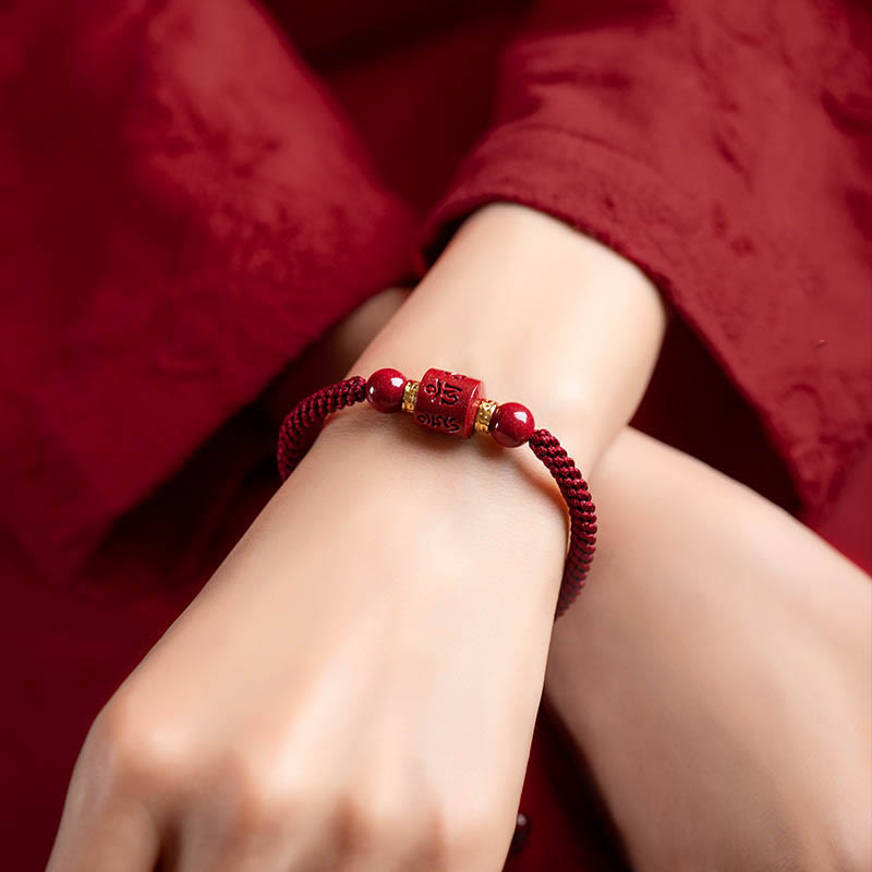 Buddha Stonesチベット 辰砂オーム・マニ・パドメ・フム刻印入り 祝福 編み込み ブレスレット