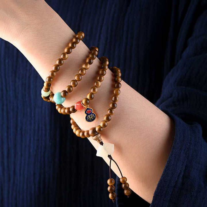 Buddha Stonesチベットローズウッド 保護 静寂 ブレスレットMala