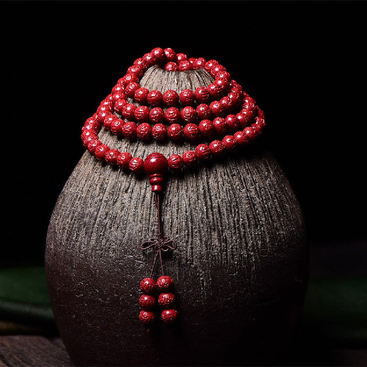 Buddha Stones 108Malaビーズ 辰砂Om Mani Padme Hum模様 刻印入り 祝福ブレスレット