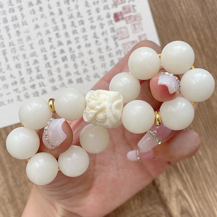 Buddha Stones銀の輝き 黒曜石 菩提樹の種 象牙 フルーツ ダンシングライオン 守護ブレスレット