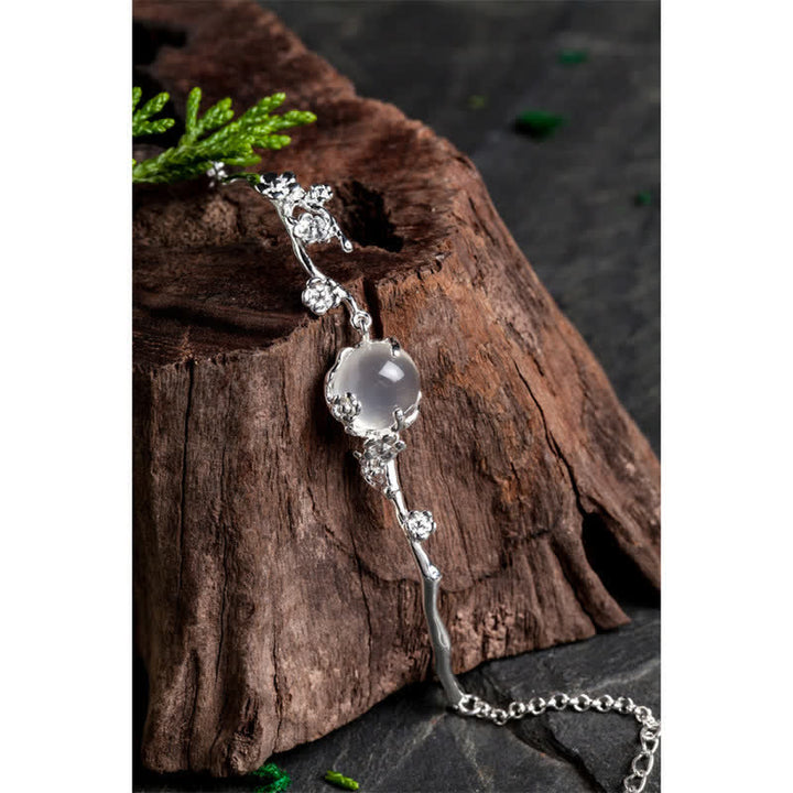 Buddha Stones 梅花モチーフの玉髄 ポジティブエネルギーブレスレット