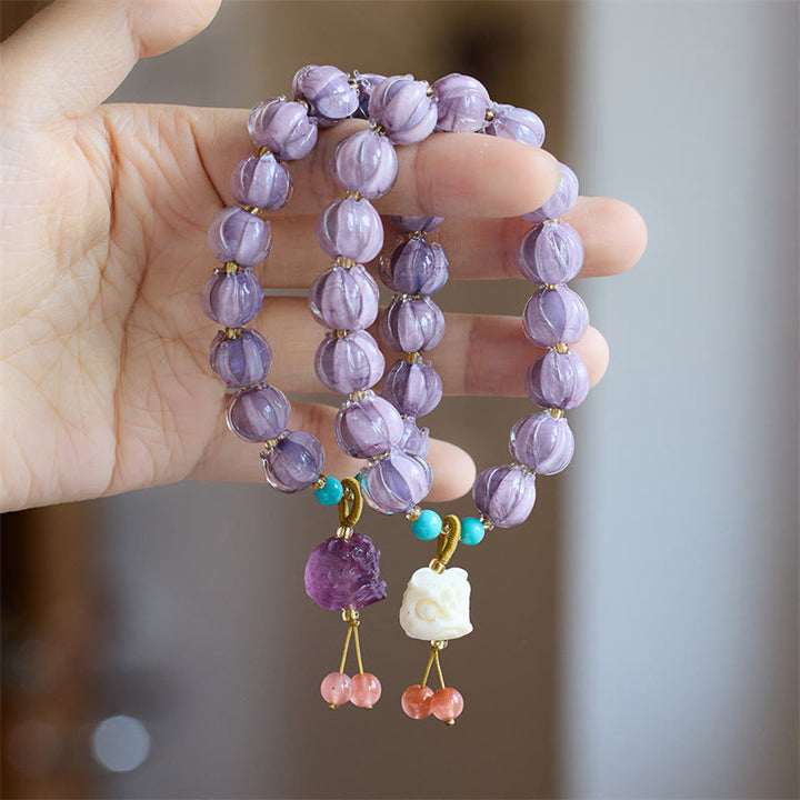 Buddha Stones琉璃ガラスビーズ 蓮の花模様 蛍石 アイボリー フルーツダンシングライオンチャーム 悟りのブレスレット