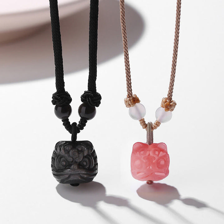 Buddha Stones天然銀光沢黒曜石 赤瑪瑙 踊るライオン 守護ネックレス ペンダント
