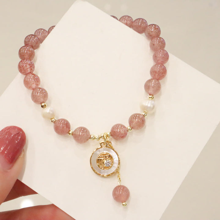 Buddha Stonesストロベリークォーツパール エルク スマイリーフェイス フィッシュテール フーキャラクターチャーム ヒーリングブレスレット