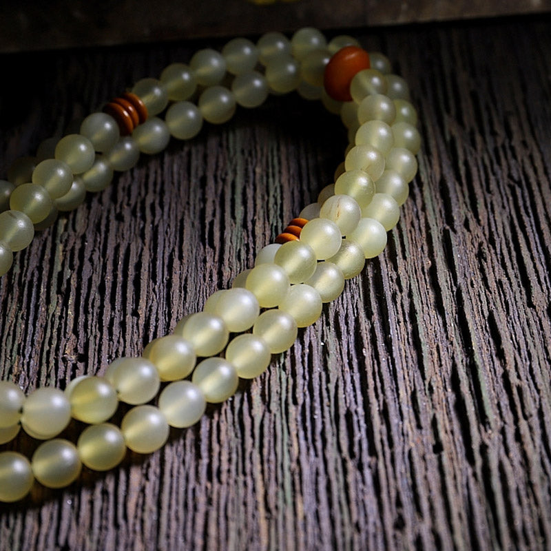 Buddha Stones108 個入りMalaビーズ チベット産 羊角琥珀 幸運のブレスレット