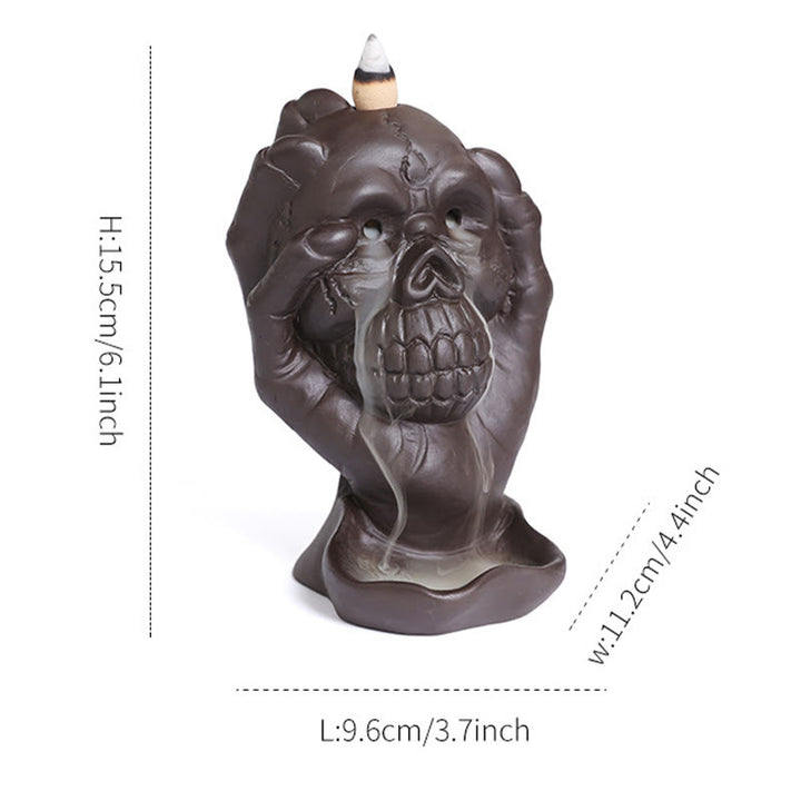 ハロウィンのBuddha Stonesとゴーストハンドの頭蓋骨、紫粘土のスピリチュアルな香炉の装飾