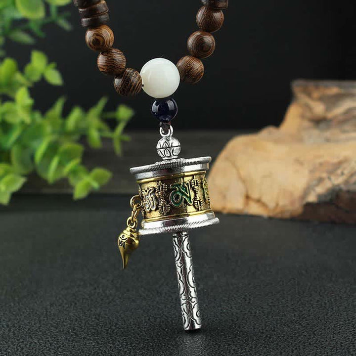 Buddha Stonesチベットオーム・マニ・パドメ・フム祈祷ホイール回転 金剛杵 木製ネックレス ペンダント - image 1