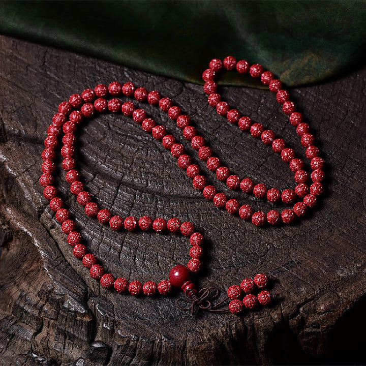 Buddha Stones 108Malaビーズ 辰砂Om Mani Padme Hum模様 刻印入り 祝福ブレスレット