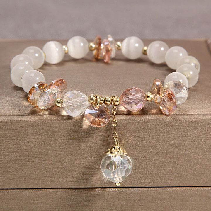 Buddha Stonesキャッツアイ ピンククリスタル ピースチャームブレスレット