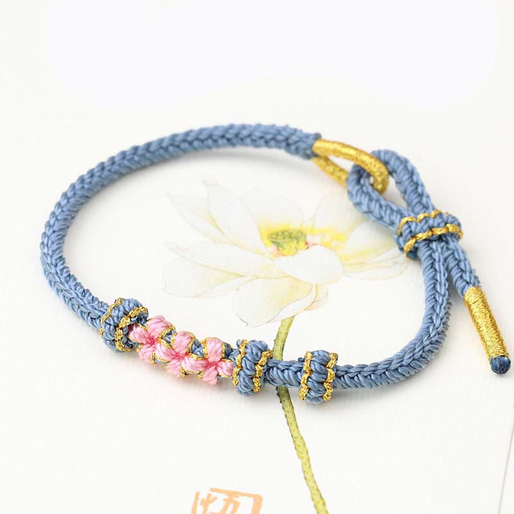 Buddha Stones手作りの三つの桃の花の幸運の8連編み紐ブレスレット