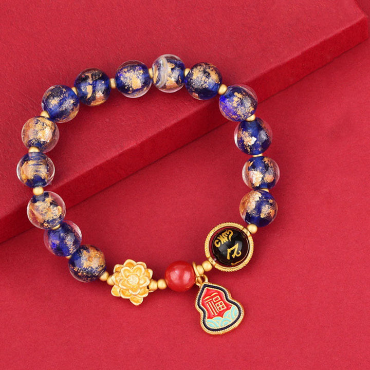 チベットのBuddha Stones、オーム・マニ・パドメ・フムフムフーのキャラクターひょうたんチャーム、蓮華座のガラスビーズ、幸運ブレスレット