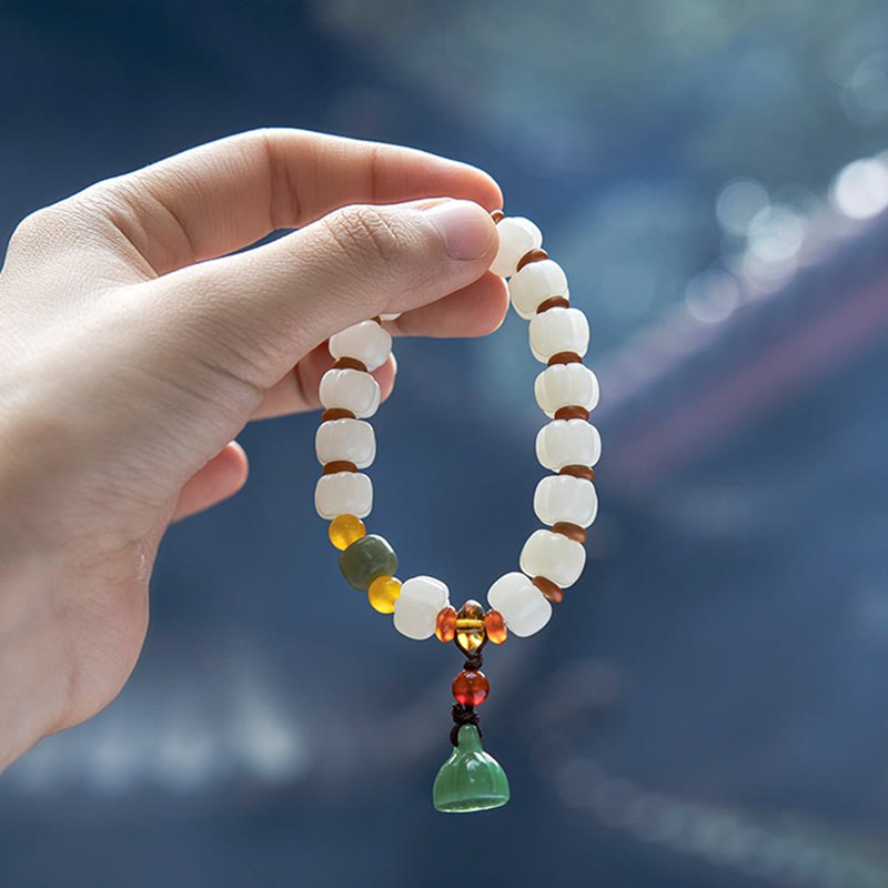 天然菩提樹レッドアゲート菩提樹の穏やかな調和の彫刻が施されたパンプキンビーズの蓮のブレスレット
