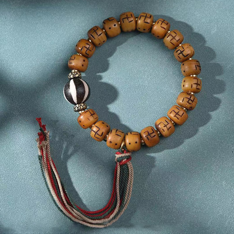 Buddha Stones天然チベットラクダ骨卍 Dzi ビーズ Shankha 仏陀チャーム Kirtimukha 幸運保護タッセルブレスレット