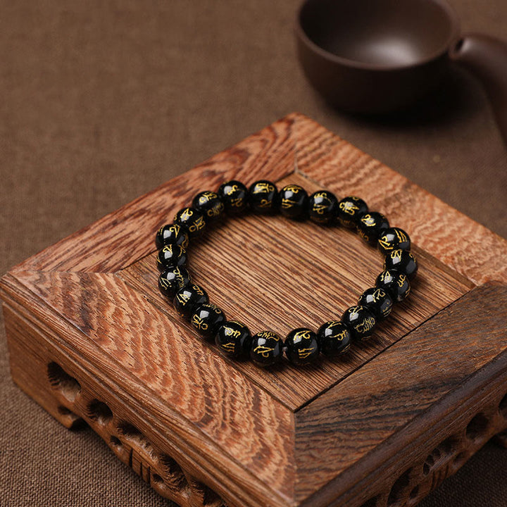 Buddha Stonesチベット ホワイトクリスタル ブラックオニキスオーム・マニ・パドメ・フム瞑想ブレスレット