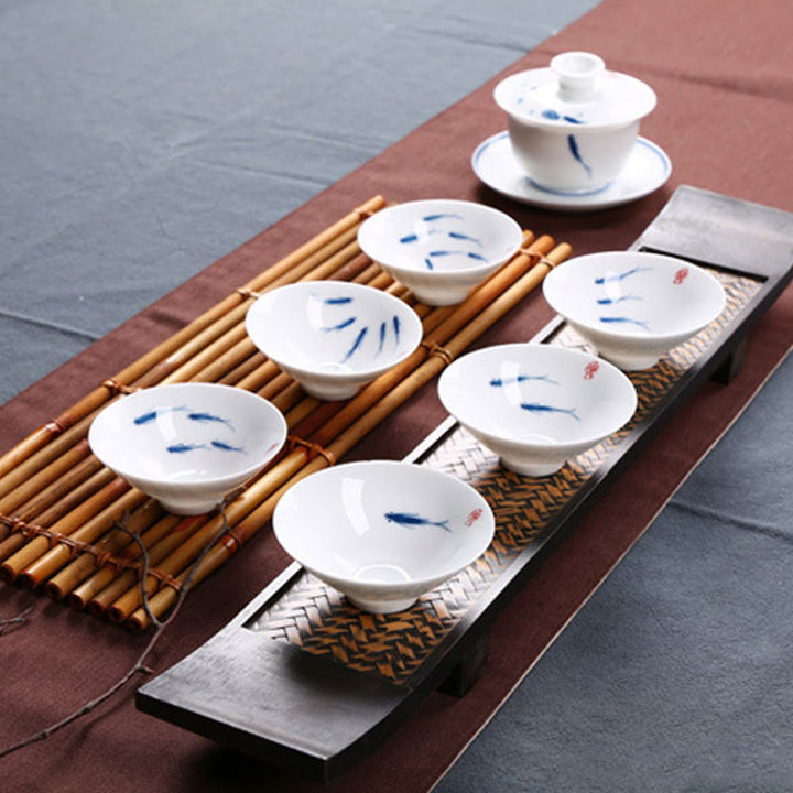 Buddha Stonesの青白磁の鯉の陶器ティーカップ、カンフーティーカップ