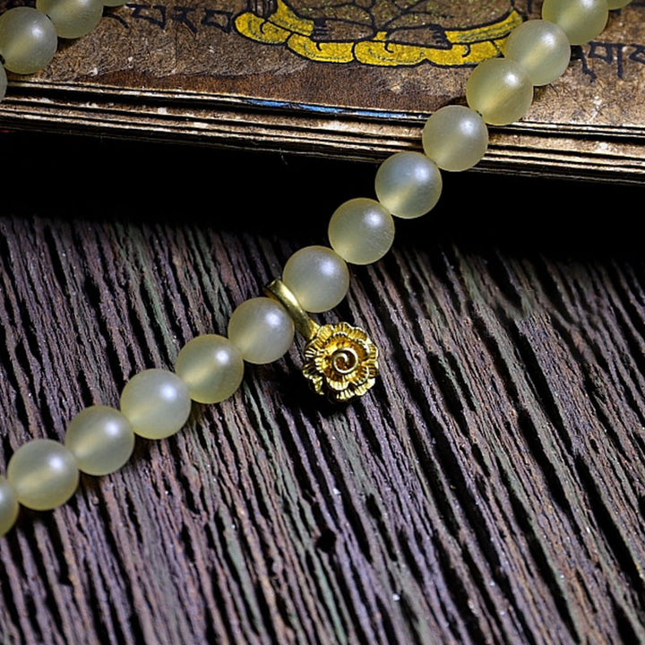 Buddha Stones108 個入りMalaビーズ チベット産 羊角琥珀 幸運のブレスレット