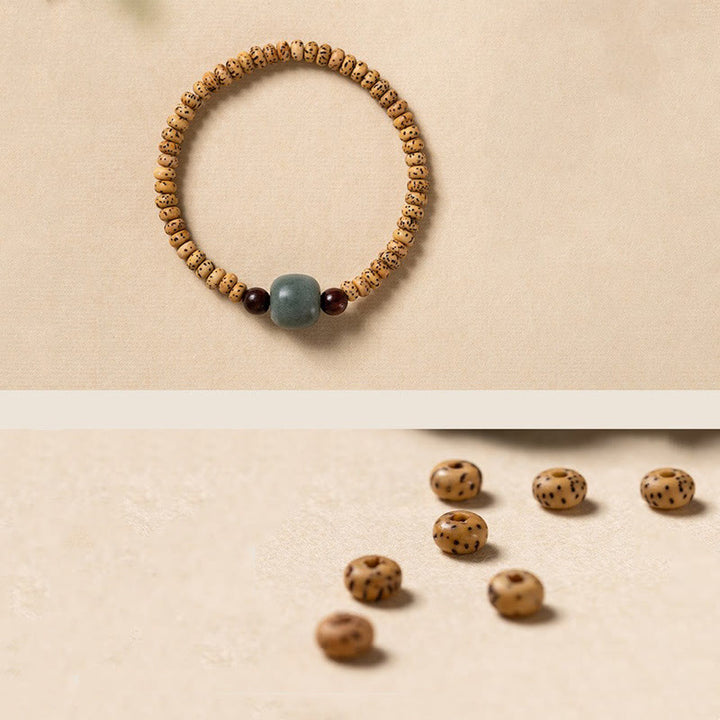Buddha Stones菩提樹の小さな葉の紫檀の知恵のブレスレット