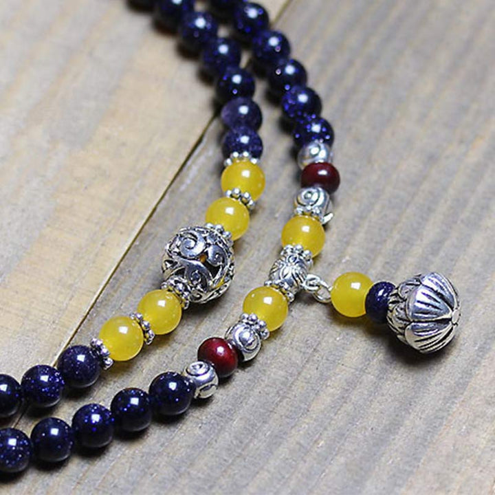 Buddha Stonesブルーサンドストーン 富のチャームブレスレットMala