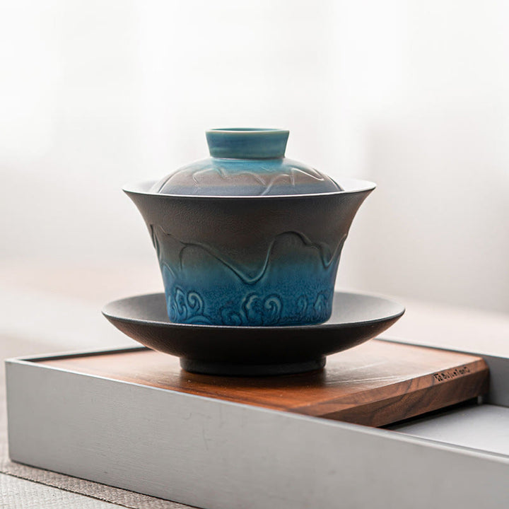 Buddha Stonesレトロブルーオーシャン海の波グラデーションセラミック蓋湾三彩ティーカップカンフーティーカップとソーサー蓋付き