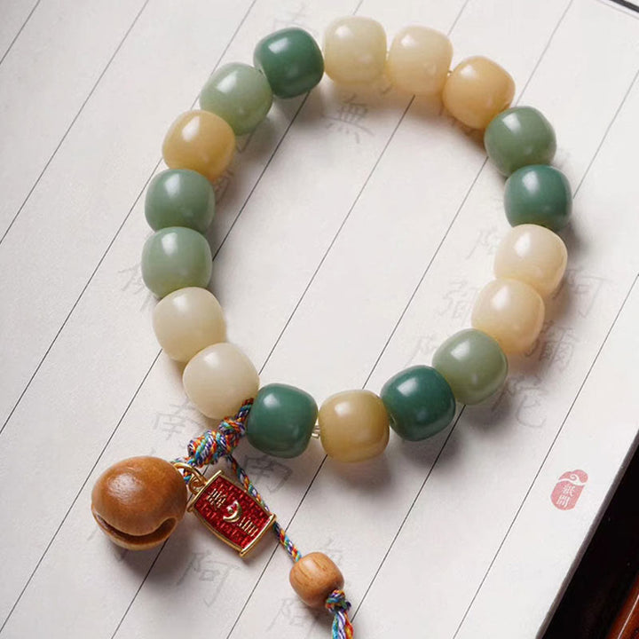 Buddha Stonesナチュラルグラデーション 菩提樹の知恵 木製 魚 ドラム チャーム ブレスレット