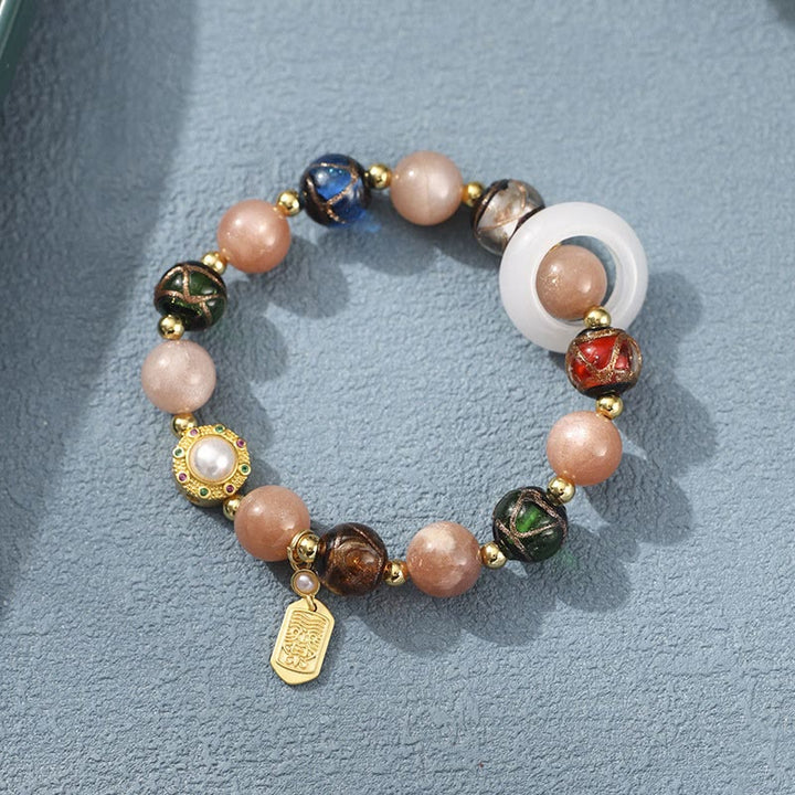 Buddha Stonesチベットのお香灰 リュウリガラス シャコガイ石 太陽石オーム・マニ・パドメ・フム祈祷ホイールチャームブレスレット