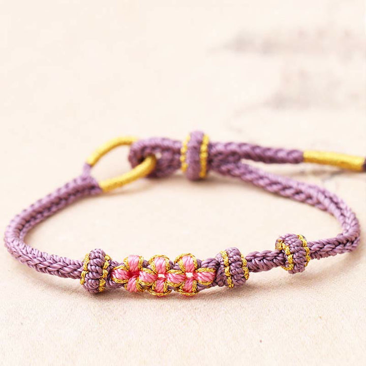 Buddha Stones手作りの三つの桃の花の幸運の8連編み紐ブレスレット