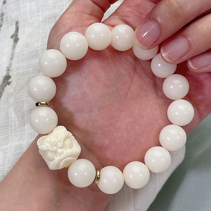 Buddha Stones銀の輝き 黒曜石 菩提樹の種 象牙 フルーツ ダンシングライオン 守護ブレスレット