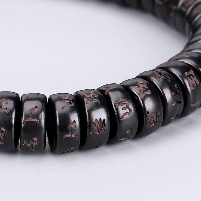 Buddha Stonesチベットココナッツシェルビーズ 彫刻入りオーム・マニ・パドメ・フムマントラ ポジティブストリングブレスレット